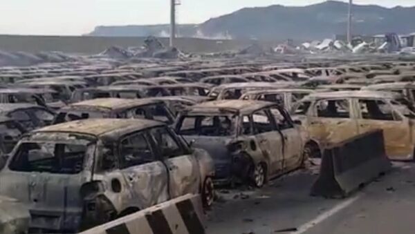 Готовили на экспорт — в Италии при пожаре сгорели сотни новых Maserati. Видео - Sputnik Кыргызстан