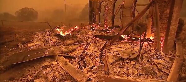 Город Парадайс в США охвачен огнем Город Парадайс в США охвачен огнем - Sputnik Кыргызстан