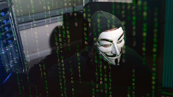 Человек в маске имитирует хакерскую деятельность. Архивное фото - Sputnik Кыргызстан