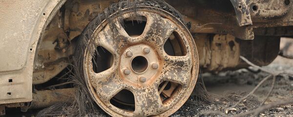 Сгоревший автомобиль. Архивное фото - Sputnik Кыргызстан