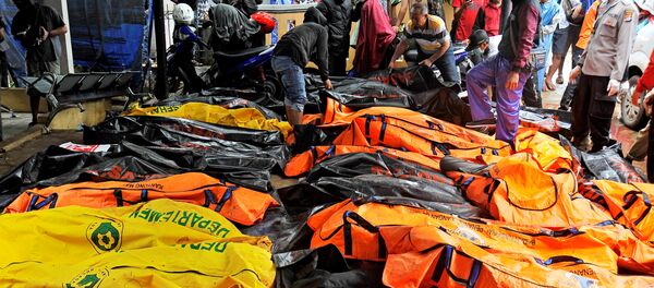 Последствия цунами в Карите. Индонезия - Sputnik Кыргызстан