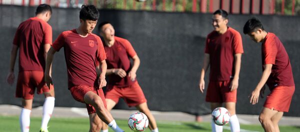 Игроки сборной Китая по футболу. Архивное фото Игроки сборной Китая по футболу. Архивное фото - Sputnik Кыргызстан
