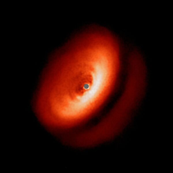 Пылевой диск вокруг молодой звезды IM Lupi - Sputnik Кыргызстан