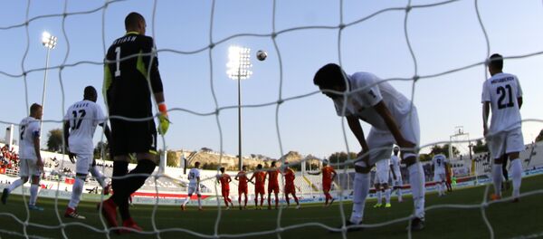 Игроки сборной Кыргызстана по футболу после пропущенного гола во время матча со сборной Китая в групповом этапе Кубка Азии по футболу в ОАЭ. 7 января 2019 года - Sputnik Кыргызстан