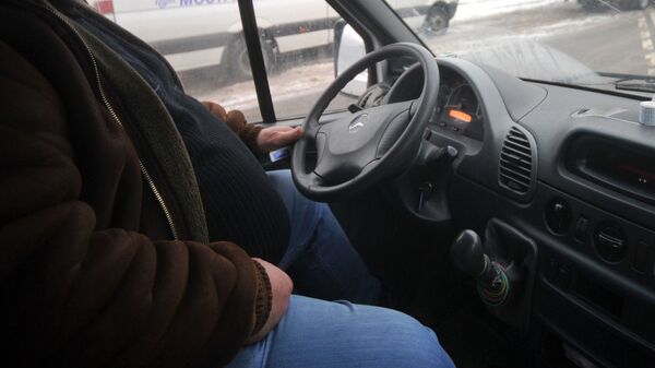 Водитель за рулем. Архивное фото - Sputnik Кыргызстан