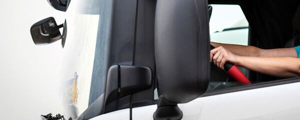 Дальнобойщик во время работы. Архивное фото - Sputnik Кыргызстан