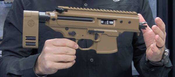 Самый миниатюрный автомат представила немецкая оружейная компания — видео Самый миниатюрный автомат представила немецкая оружейная компания — видео - Sputnik Кыргызстан