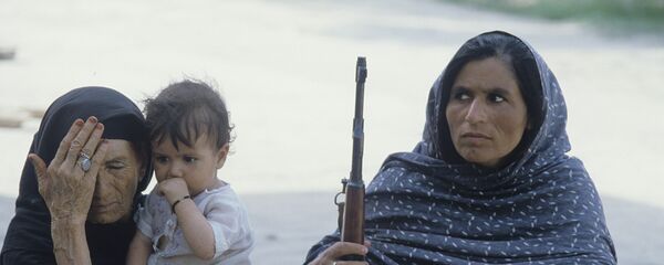 Девушек убивали за непокрытые головы – 11 фото кыргызстанцев об афганской войне - Sputnik Кыргызстан