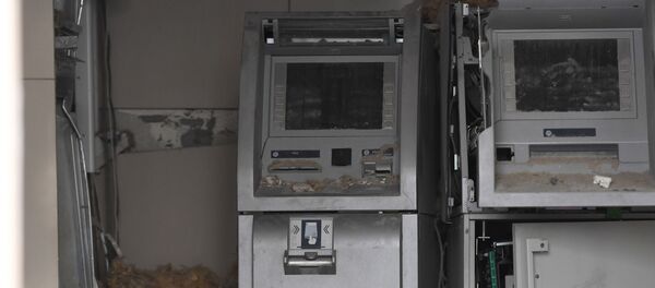 Разбитые банкоматы. Архивное фото - Sputnik Кыргызстан