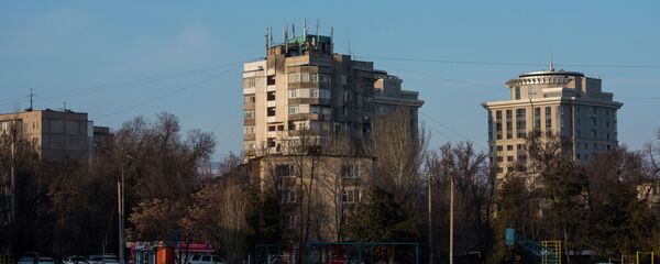 Жилые дома в одном из микрорайонов Бишкека Жилые дома в одном из микрорайонов Бишкека - Sputnik Кыргызстан