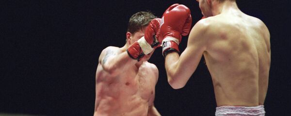 Кикбоксеры во время боя. Архивное фото Кикбоксеры во время боя. Архивное фото - Sputnik Кыргызстан