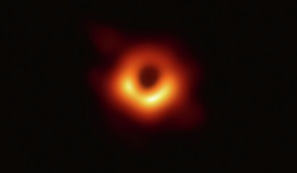Астрофизиктер тарыхта алгачкы ирет Messier 87 галактикасындагы кара чекиттин сүрөтүн тартышты. Ал жерден 53 миллион жыл алыстыкта турат. - Sputnik Кыргызстан