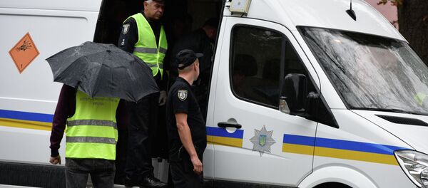 Сотрудники полиции Киева на месте происшествия. Архивное фото - Sputnik Кыргызстан