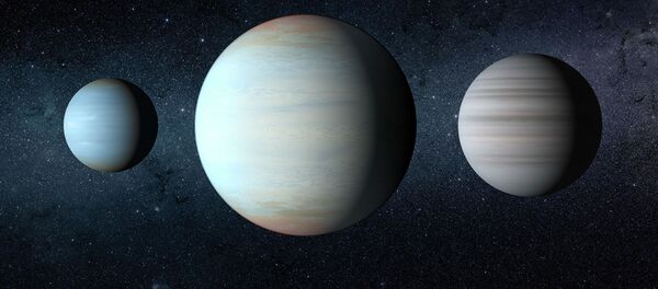 Третья планета (в центре), открытая в уникальной звездной системе Kepler-47 - Sputnik Кыргызстан