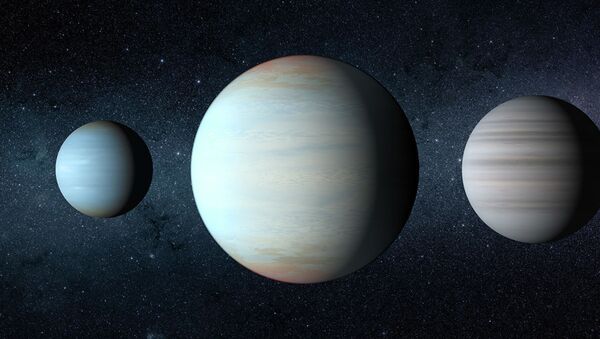 Третья планета (в центре), открытая в уникальной звездной системе Kepler-47 - Sputnik Кыргызстан