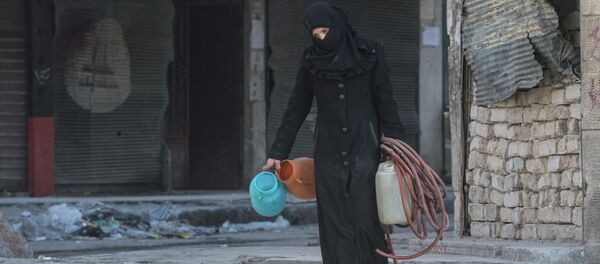 Сириядагы аял. Архивдик сүрөт Сириядагы аял. Архивдик сүрөт - Sputnik Кыргызстан