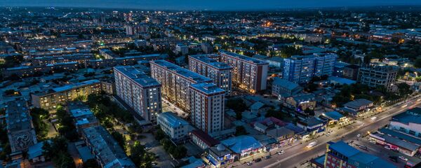 Вид на новостройки города Ош ночью с высоты. Архивное фото Вид на новостройки города Ош ночью с высоты. Архивное фото - Sputnik Кыргызстан