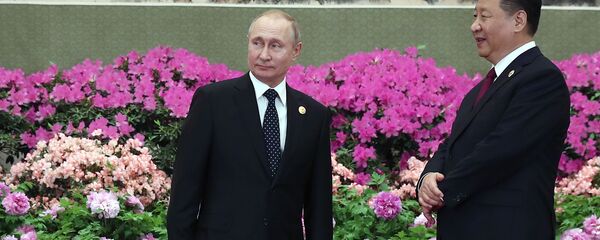 Президент РФ Владимир Путин и председатель Китайской народной республики (КНР) Си Цзиньпин. Архивное фото - Sputnik Кыргызстан