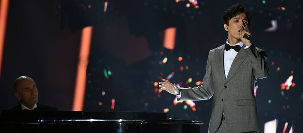 Казахстанский музыкант Димаш Кудайберген. Архивное фото Казахстанский музыкант Димаш Кудайберген. Архивное фото - Sputnik Кыргызстан