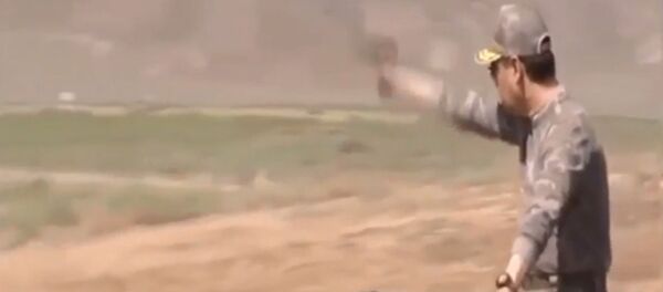 Глава Туркменистана стреляет по мишеням, сидя на велосипеде — видео - Sputnik Кыргызстан