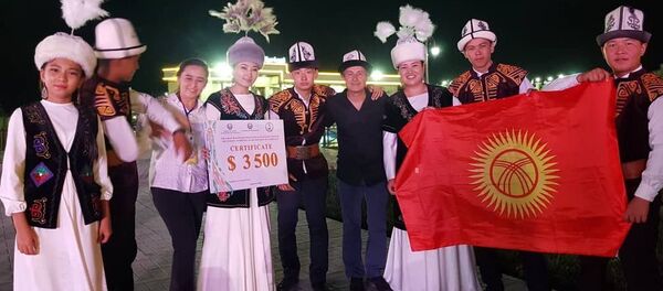 Ансамбль Ибарат из Кыргызстана стал победителем международного фольклорного музыкального фестиваля Великий Шелковый путь в Узбекистане - Sputnik Кыргызстан