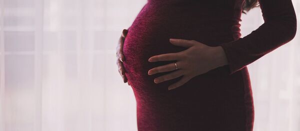 Беременная женщина Беременная женщина - Sputnik Кыргызстан