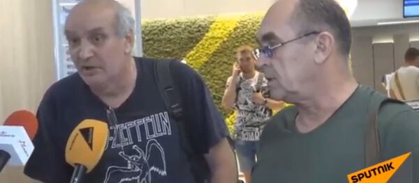 Российские моряки, задержанные ранее на Украине, прибыли в аэропорт Кишинева - Sputnik Кыргызстан