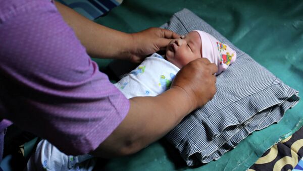 Рождение ребенка в Палембанге - Sputnik Кыргызстан