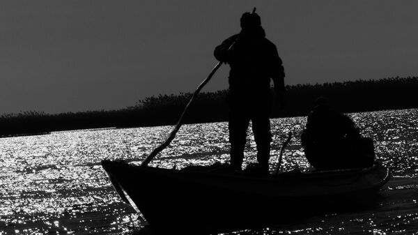 Рыбак во время рыбалки  - Sputnik Кыргызстан