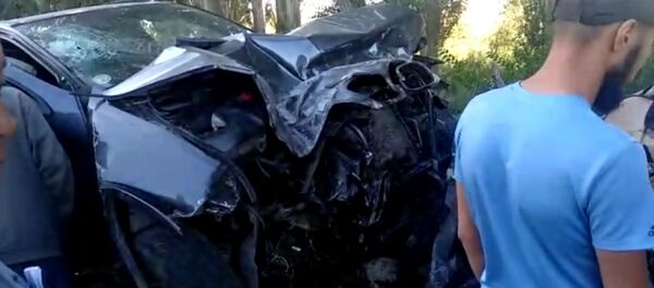 Страшное ДТП на Иссык-Куле — первые минуты после аварии снял очевидец. Видео Страшное ДТП на Иссык-Куле — первые минуты после аварии снял очевидец. Видео - Sputnik Кыргызстан