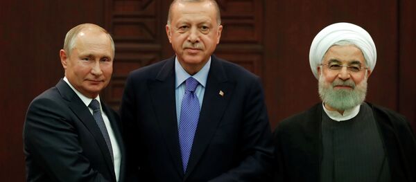 Президенты России, Турции и Ирана — Владимир Путин, Реджеп Тайип Эрдоган и Хасан Роухани на трехсторонних переговорах по урегулированию конфликта в Сирии в Анкаре. 16 сентября 2019 года - Sputnik Кыргызстан