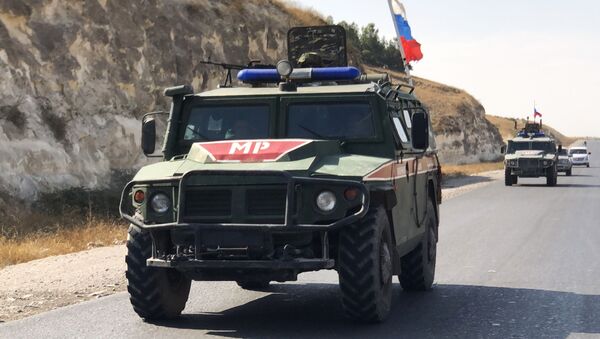 Бронеавтомобили военной полиции РФ на северо-востоке провинции Алеппо в Сирии. - Sputnik Кыргызстан
