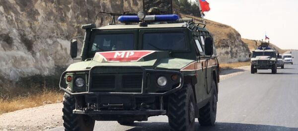Бронеавтомобили военной полиции РФ на северо-востоке провинции Алеппо в Сирии. - Sputnik Кыргызстан