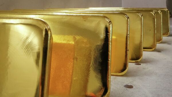 Слитки из чистого золота. Архивное фото - Sputnik Кыргызстан