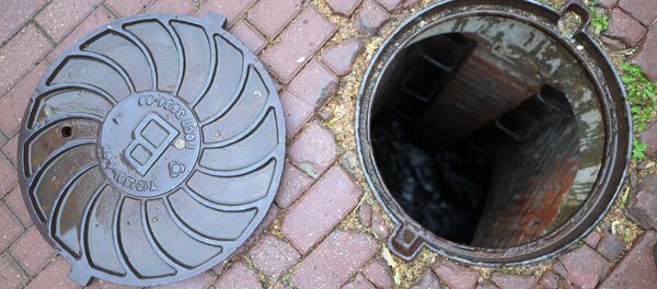 Канализационный люк. Архивное фото - Sputnik Кыргызстан