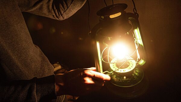 Горящая электрическая лампа. Иллюстративное фото - Sputnik Кыргызстан