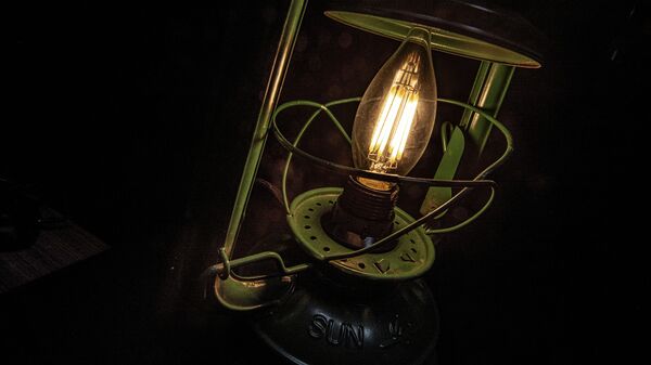 Горящая электрическая лампа. Иллюстративное фото - Sputnik Кыргызстан