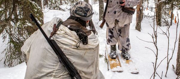 Охотники во время охоты. Архивное фото - Sputnik Кыргызстан