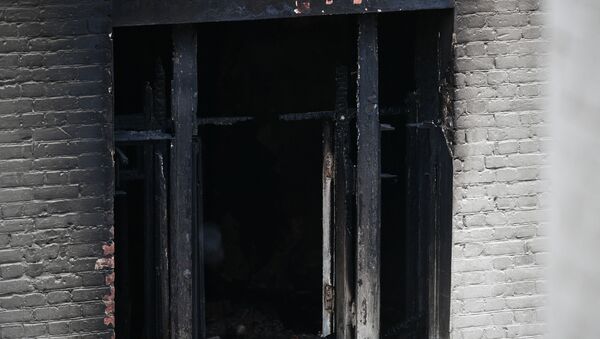 Окно в жилом доме где произошел пожар. Архивное фото - Sputnik Кыргызстан