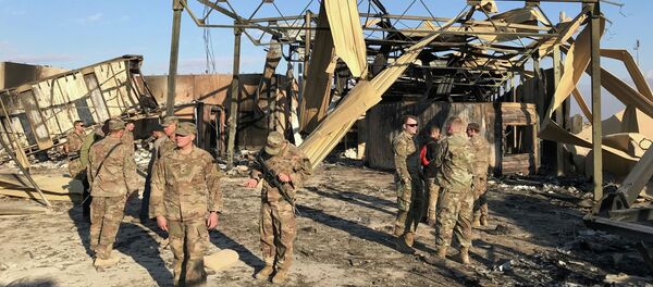 Ракетные удары по авиабазе США Айн аль-Асад на западе Ирака - Sputnik Кыргызстан