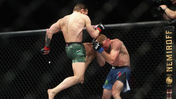 Бой Конора Макгрегора и Дональда Серроне в турнире UFC 246 в Лас-Вегасе - Sputnik Кыргызстан