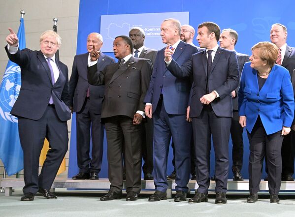 Поездка президента РФ В. Путина в Берлин для участия в Международной конференции по Ливии - Sputnik Кыргызстан