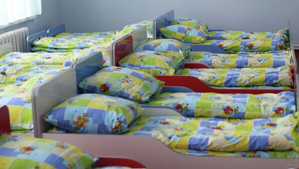 Кровати в детском саду. Архивное фото - Sputnik Кыргызстан