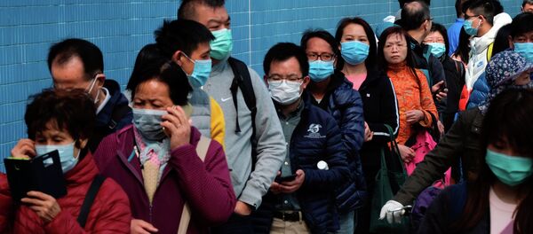 Жители Гонконга стоят в очереди за медицинскими масками. Архивное фото - Sputnik Кыргызстан
