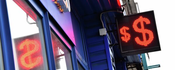 Знаки доллара на табло курса валют. Архивное фото - Sputnik Кыргызстан