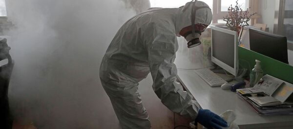 Дезинфекция офисного помещения. Архивное фото - Sputnik Кыргызстан