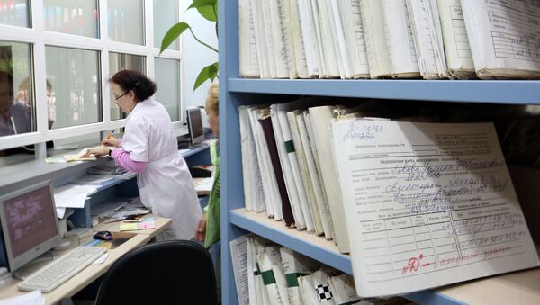 Медицинский работник в поликлинике. Архивное фото - Sputnik Кыргызстан