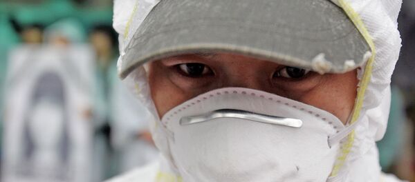 Мужчина в медицинской маске. Архивное фото Мужчина в медицинской маске. Архивное фото - Sputnik Кыргызстан