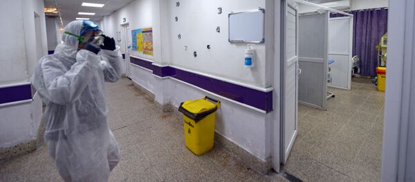 Дарыгер коопсуз бет капчан ооруканада иш учурунда. Архив - Sputnik Кыргызстан