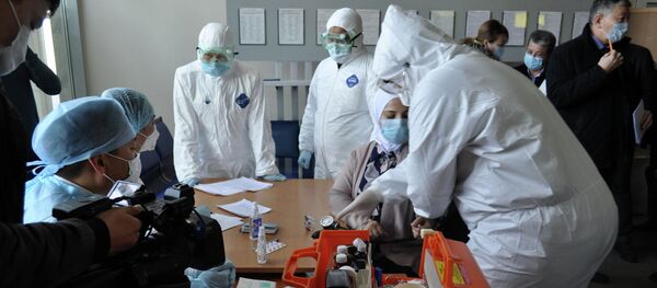 Учения на случай выявления человека с коронавирусом в аэропорту Манас. Архивное фото Учения на случай выявления человека с коронавирусом в аэропорту Манас. Архивное фото - Sputnik Кыргызстан